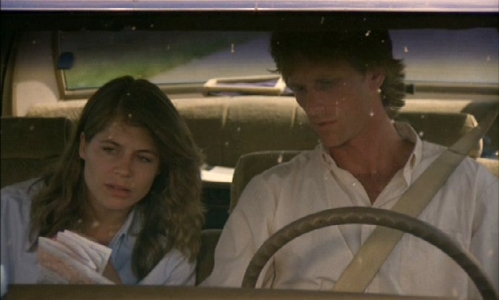 While Burt and Vicky are driving down the highway we get a good shot of a paperback book on the dashboard of their vehicle. What is the title of this book?