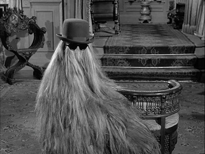 What was cousin Itt's favorite hangout place at the Addamses'?