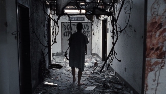 When Rick first left the hospital in season 1, what was the name of the first living man he encountered?